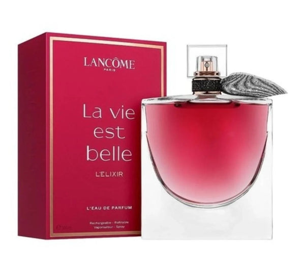 Lancôme La Vie Est Belle L'Elixir perfume bottle with a pink-red liquid and a gray feather accent, shown next to its red packaging box with gold trim on a white background.