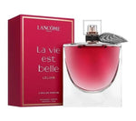 Lancôme La Vie Est Belle L'Elixir perfume bottle with a pink-red liquid and a gray feather accent, shown next to its red packaging box with gold trim on a white background.